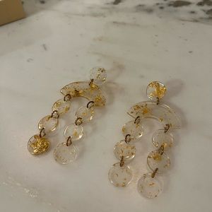 Gold and clear resin earrings